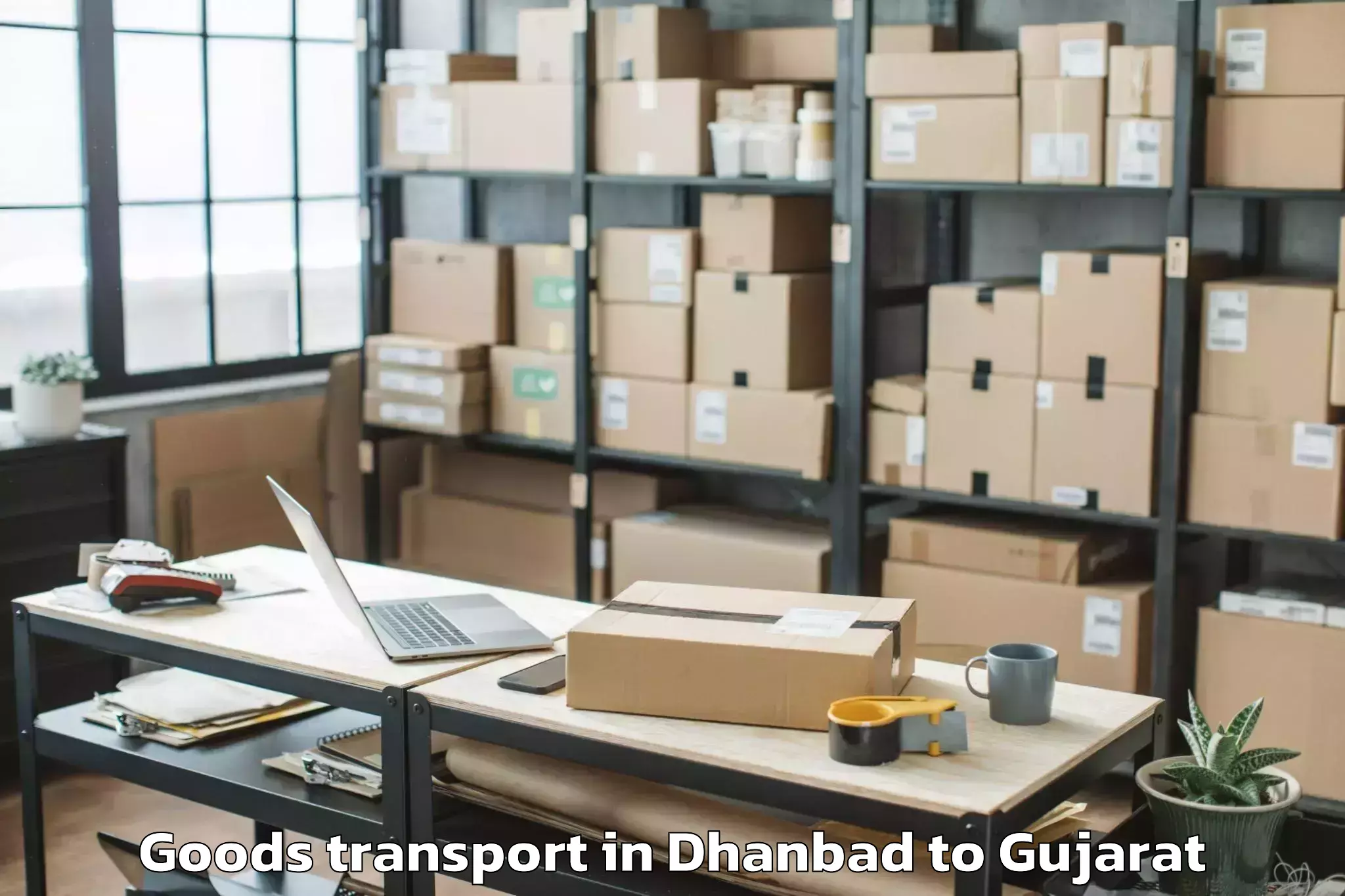 Top Dhanbad to Balasinor Goods Transport Available